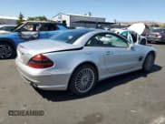 ✅ 2005 Mercedes-Benz SL 55 AMG • VIN: WDBSK74F35F088815 • Лот: 58671335. Опубликован ранее на Copart с пробегом 99 885 миль. Бесплатный доступ к архиву аукционных продаж из США и подробный отчёт об истории автомобиля на DreamBid. Изображение 3.