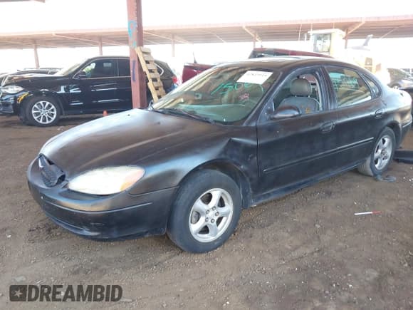 ✅ 2002 Ford Taurus SES Standard • VIN: 1FAFP55262G244684 • Lot: 42823919. Listed on IAAI with 164,232 mi. Free auction sales archive from the USA and detailed vehicle history report at DreamBid. Image 2.