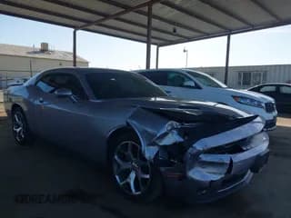 ✅ 2015 Dodge Challenger SXT Plus • VIN: 2C3CDZBGXFH700231 • Lot: 43407846. Wystawiony na IAAI z przebiegiem 129 305 mil. Bezpłatny archiwum sprzedaży aukcyjnych z USA i szczegółowy raport historii pojazdu na DreamBid. Zdjęcie 1.