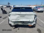 ✅ 2023 Kia EV6 Wind • VIN: KNDC3DLC7P5141582 • Лот: 42080782. Опубликован ранее на IAAI с пробегом 35 918 миль. Бесплатный доступ к архиву аукционных продаж из США и подробный отчёт об истории автомобиля на DreamBid. Изображение 17.