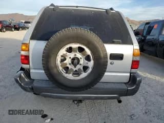 ✅ 1999 Isuzu Rodeo S • VIN: 4S2CK58W2X4361475 • Lot: 63873864. Wystawiony na Copart z przebiegiem 232 406 mil. Bezpłatny archiwum sprzedaży aukcyjnych z USA i szczegółowy raport historii pojazdu na DreamBid. Zdjęcie 6.