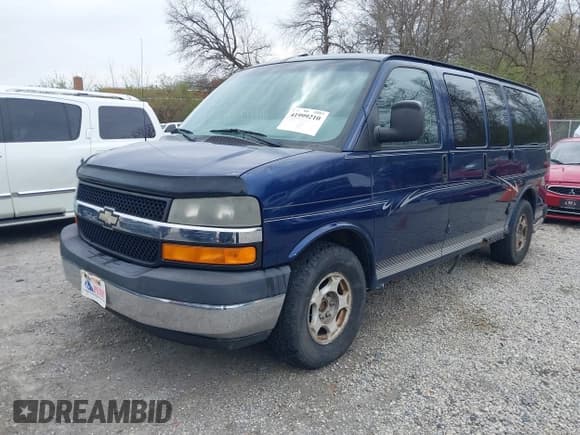 ✅ 2004 Chevrolet Express Passenger • VIN: 1GBFG15T441159106 • Lot: 41999210. Listed on IAAI with 245,286 mi. Free auction sales archive from the USA and detailed vehicle history report at DreamBid. Image 2.
