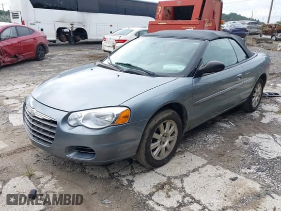 ✅ 2006 Chrysler Sebring GTC • VIN: 1C3EL75R26N283658 • Lot: 42923382. Listed on IAAI with 119,846 mi. Free auction sales archive from the USA and detailed vehicle history report at DreamBid. Image 2.