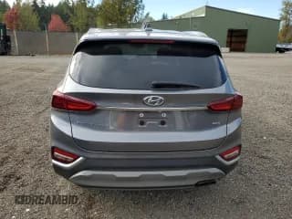 ✅ 2019 Hyundai Santa Fe SEL • VIN: 5NMS3CAD6KH037964 • Лот: 86651205. Опубликован ранее на Copart с пробегом 133 821 миль. Бесплатный доступ к архиву аукционных продаж из США и подробный отчёт об истории автомобиля на DreamBid. Изображение 6.