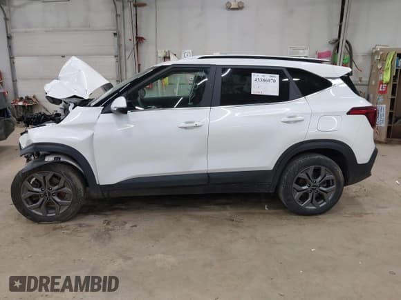 ✅ 2024 Kia Seltos S • VIN: KNDEUCAAXR7607613 • Lot: 43386070. Listed on IAAI with 33,393 mi. Free auction sales archive from the USA and detailed vehicle history report at DreamBid. Image 14.
