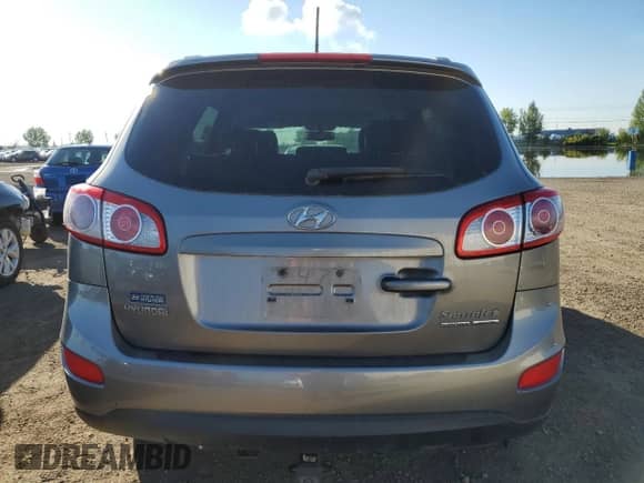 2011 Hyundai Santa Fe GLS с VIN 5XYZGDAG4BG041234, выставлен на аукционе Copart как лот 69840025 с пробегом 229 215 миль миль и Списание • Salvage title. История ставок и продаж доступна на DreamBid. Изображение 6.