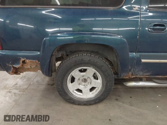 ✅ 2005 Chevrolet Suburban LS • VIN: 1GNFK16Z05J146942 • Lot: 43652691. Listed on IAAI with 253,470 mi. Free auction sales archive from the USA and detailed vehicle history report at DreamBid. Image 13.