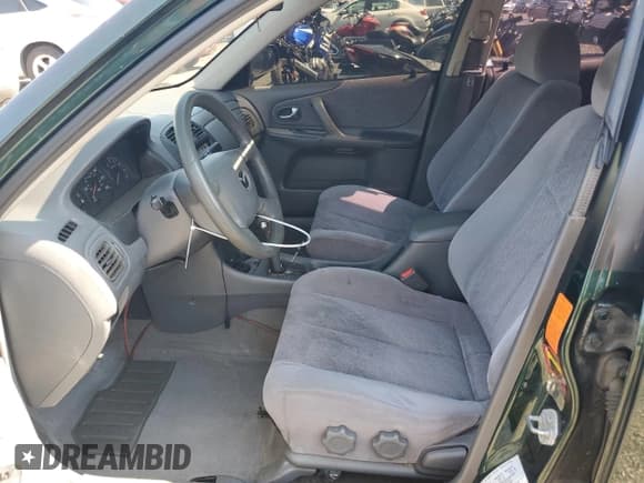 ✅ 2000 Mazda Protege ES • VIN: JM1BJ2239Y0268002 • Lot: 81656605. Listed on Copart with 233,894 mi. Free auction sales archive from the USA and detailed vehicle history report at DreamBid. Image 7.