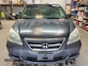 ✅ 2006 Honda Odyssey EX • VIN: 5FNRL38426B455322 • Lot: 86608495. Listed on Copart with 135,114 mi. Free auction sales archive from the USA and detailed vehicle history report at DreamBid. Image 5.