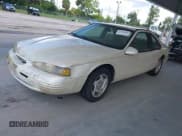 ✅ 1997 Ford Thunderbird LX • VIN: 1FALP62W8VH124321 • Лот: 42730854. Опубликован ранее на IAAI с пробегом 152 349 миль. Бесплатный доступ к архиву аукционных продаж из США и подробный отчёт об истории автомобиля на DreamBid. Изображение 2.