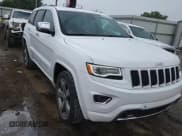 ✅ 2016 Jeep Grand Cherokee Overland • VIN: 1C4RJFCG5GC385029 • Lot: 80877655. Listed on Copart with 111,235 mi. Free auction sales archive from the USA and detailed vehicle history report at DreamBid. Image 14.