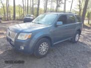 ✅ 2011 Mercury Mariner Premier • VIN: 4M2CN8HG7BKJ06994 • Lot: 42035494. Listed on IAAI with 145,401 mi. Free auction sales archive from the USA and detailed vehicle history report at DreamBid. Image 2.