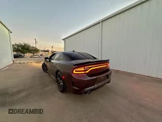 ✅ 2018 Dodge Charger R/T Scat Pack • VIN: 2C3CDXGJ8JH239533 • Lot: 94879435. Listed on Copart with 150,149 mi. Free auction sales archive from the USA and detailed vehicle history report at DreamBid. Image 3.