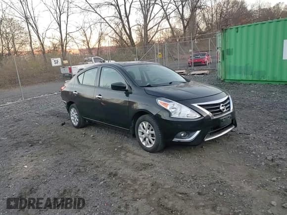 ✅ 2018 Nissan Versa SV • VIN: 3N1CN7AP4JL809916 • Lot: 93520535. Listed on Copart with 102,766 mi. Free auction sales archive from the USA and detailed vehicle history report at DreamBid. Image 13.