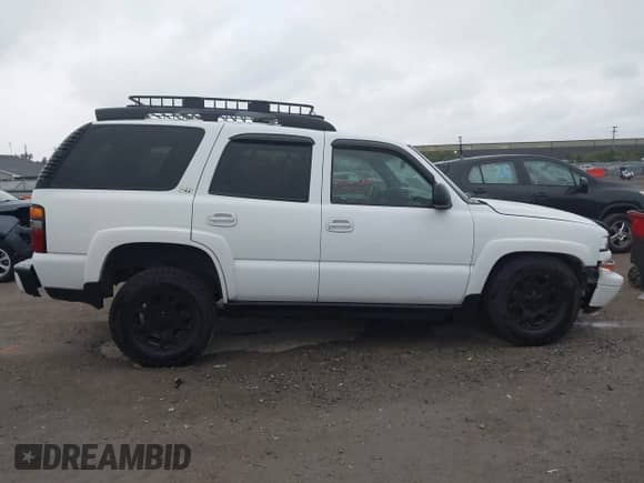 2002 Chevrolet Tahoe Z71 с VIN 1GNEK13Z02R311109, выставлен на аукционе IAAI как лот 43134263 с пробегом 206 010 миль миль и . История ставок и продаж доступна на DreamBid. Изображение 13.