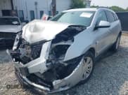 ✅ 2013 Cadillac SRX • VIN: 3GYFNAE36DS591139 • Lot: 42393147. Listed on IAAI with 128,899 mi. Free auction sales archive from the USA and detailed vehicle history report at DreamBid. Image 2.