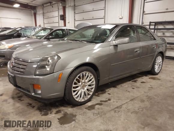 ✅ 2006 Cadillac CTS • VIN: 1G6DM57T860100264 • Лот: 41699855. Опубликован ранее на IAAI с пробегом 93 165 миль. Бесплатный доступ к архиву аукционных продаж из США и подробный отчёт об истории автомобиля на DreamBid. Изображение 2.