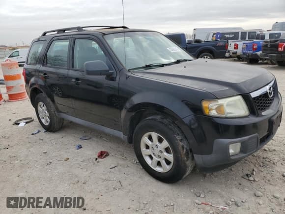 ✅ 2009 Mazda Tribute Touring • VIN: 4F2CZ02739KM03047 • Lot: 43086245. Wystawiony na Copart z przebiegiem 164 566 mil. Bezpłatny archiwum sprzedaży aukcyjnych z USA i szczegółowy raport historii pojazdu na DreamBid. Zdjęcie 4.