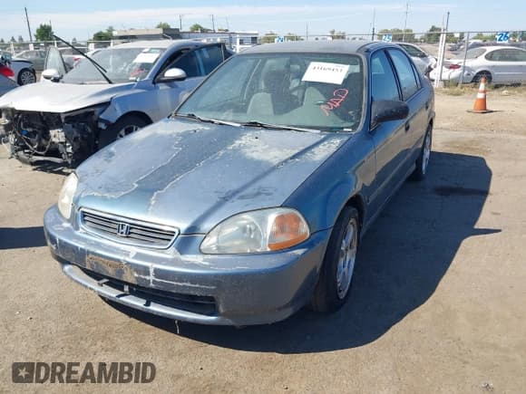✅ 1997 Honda Civic LX • VIN: JHMEJ6675VS029448 • Lot: 43169453. Wystawiony na IAAI z przebiegiem 196 032 mil. Bezpłatny archiwum sprzedaży aukcyjnych z USA i szczegółowy raport historii pojazdu na DreamBid. Zdjęcie 2.