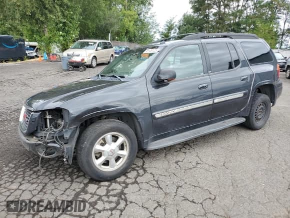 ✅ 2004 GMC Envoy SLT • VIN: 1GKET16S046203411 • Lot: 68126125. Listed on Copart with 246,450 mi. Free auction sales archive from the USA and detailed vehicle history report at DreamBid. Image 1.