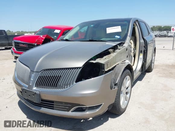✅ 2016 Lincoln MKT EcoBoost • VIN: 2LMHJ5AT9GBL01039 • Lot: 42860808. Wystawiony na IAAI z przebiegiem 124 787 mil. Bezpłatny archiwum sprzedaży aukcyjnych z USA i szczegółowy raport historii pojazdu na DreamBid. Zdjęcie 2.