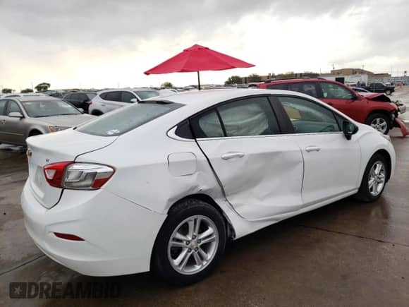 2017 Chevrolet Cruze LT z VIN 1G1BE5SM6H7167689, wystawiony jako Copart lot #66031372 z przebiegiem 143 755 mil mil oraz . Historia ofert i sprzedaży dostępna na DreamBid. Obrazek 3.