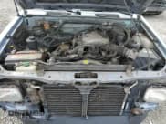 ✅ 1993 Nissan Frontier SE • VIN: 1N6HD16Y0PC408188 • Лот: 71028394. Опубликован ранее на Copart с пробегом 258 939 миль. Бесплатный доступ к архиву аукционных продаж из США и подробный отчёт об истории автомобиля на DreamBid. Изображение 11.