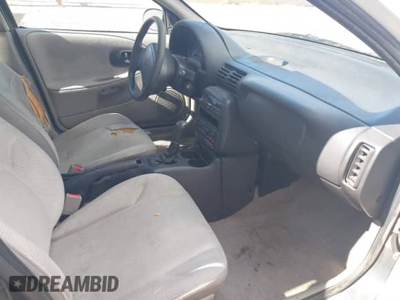 1998 Saturn SL z VIN 1G8ZF5285WZ243548, wystawiony jako IAAI lot #41659710 z przebiegiem 109 099 mil mil oraz . Historia ofert i sprzedaży dostępna na DreamBid. Obrazek 5.