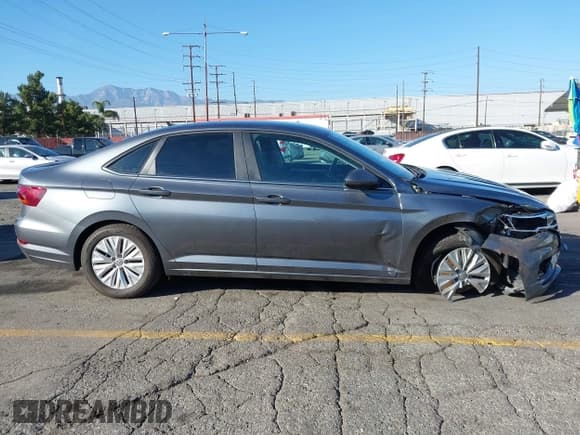 ✅ 2019 Volkswagen Jetta S • VIN: 3VWC57BUXKM063112 • Lot: 43529897. Wystawiony na IAAI z przebiegiem 63 781 mil. Bezpłatny archiwum sprzedaży aukcyjnych z USA i szczegółowy raport historii pojazdu na DreamBid. Zdjęcie 13.