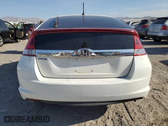 ✅ 2013 Honda Insight EX • VIN: JHMZE2H72DS001794 • Lot: 69564405. Listed on Copart with Not provided. Free auction sales archive from the USA and detailed vehicle history report at DreamBid. Image 6.