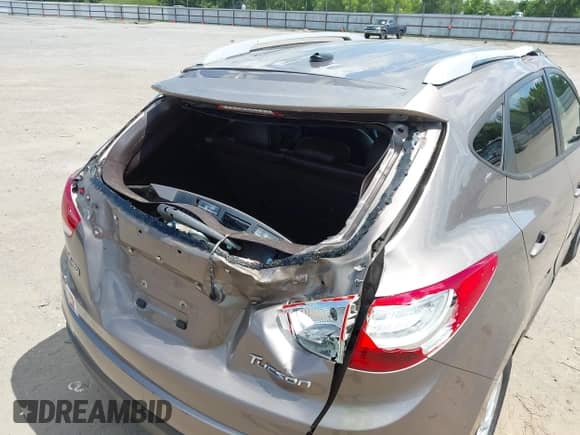 2013 Hyundai Tucson GLS z VIN KM8JU3AC5DU624633, wystawiony jako IAAI lot #42366217 z przebiegiem 108 258 mil mil oraz . Historia ofert i sprzedaży dostępna na DreamBid. Obrazek 6.