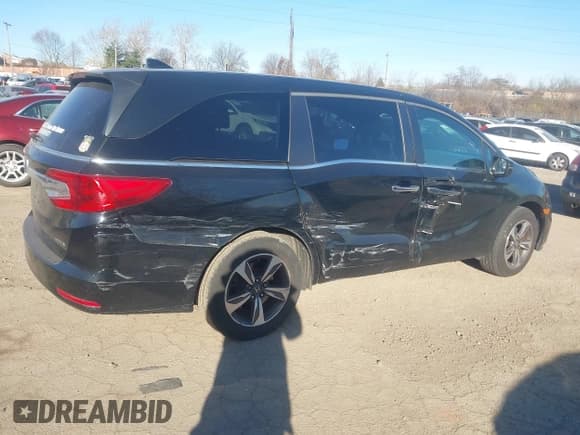 ✅ 2018 Honda Odyssey Touring • VIN: 5FNRL6H83JB012402 • Лот: 43858912. Опубликован ранее на IAAI с пробегом 133 789 миль. Бесплатный доступ к архиву аукционных продаж из США и подробный отчёт об истории автомобиля на DreamBid. Изображение 4.
