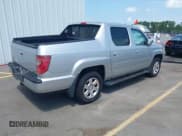 ✅ 2009 Honda Ridgeline RTS • VIN: 2HJYK16489H502952 • Lot: 42801192. Wystawiony na IAAI z przebiegiem 290 892 mil. Bezpłatny archiwum sprzedaży aukcyjnych z USA i szczegółowy raport historii pojazdu na DreamBid. Zdjęcie 4.