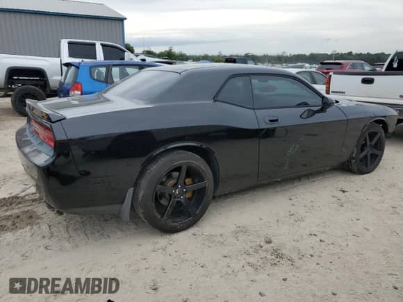 2009 Dodge Challenger R/T z VIN 2B3LJ54T19H500299, wystawiony jako Copart lot #72713494 z przebiegiem 99 954 mil mil oraz Szkoda całkowita • Salvage title. Historia ofert i sprzedaży dostępna na DreamBid. Obrazek 3.