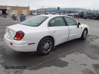 ✅ 2001 Oldsmobile Aurora • VIN: 1G3GS64C114109142 • Lot: 41974652. Wystawiony na IAAI z przebiegiem 81 395 mil. Bezpłatny archiwum sprzedaży aukcyjnych z USA i szczegółowy raport historii pojazdu na DreamBid. Zdjęcie 4.