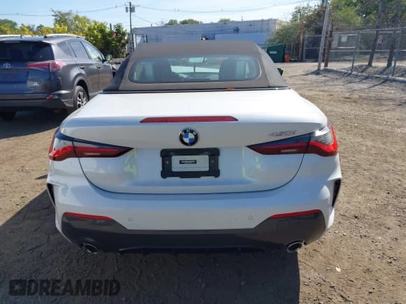 ✅ 2022 BMW 4 Series 430i • VIN: WBA23AT09NCJ00084 • Лот: 43363404. Опубликован ранее на IAAI с пробегом 27 061 миль. Бесплатный доступ к архиву аукционных продаж из США и подробный отчёт об истории автомобиля на DreamBid. Изображение 16.