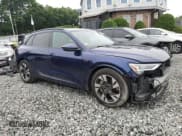 ✅ 2022 Audi e-tron Premium • VIN: WA1AAAGE6NB033857 • Lot: 64072135. Listed on Copart with 35,405 mi. Free auction sales archive from the USA and detailed vehicle history report at DreamBid. Image 4.