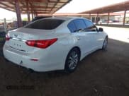 ✅ 2015 Infiniti Q50 Premium • VIN: JN1BV7AP4FM353666 • Lot: 42289579. Listed on IAAI with 96,894 mi. Free auction sales archive from the USA and detailed vehicle history report at DreamBid. Image 4.