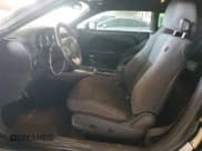 ✅ 2014 Dodge Challenger SXT • VIN: 2C3CDYAG1EH214742 • Lot: 64712454. Wystawiony na Copart z przebiegiem 144 067 mil. Bezpłatny archiwum sprzedaży aukcyjnych z USA i szczegółowy raport historii pojazdu na DreamBid. Zdjęcie 7.