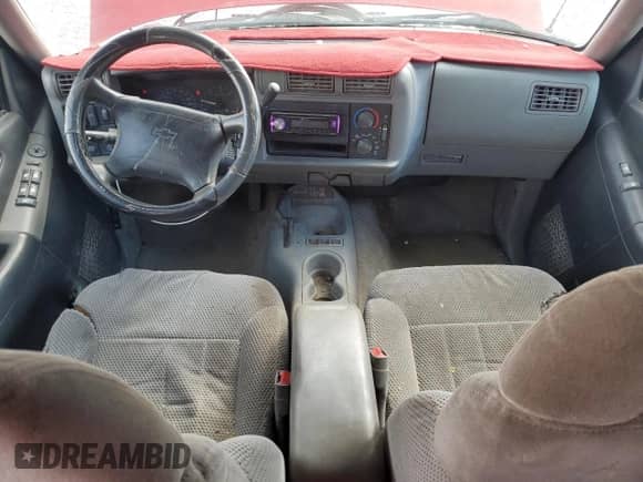 1996 Chevrolet Blazer z VIN 1GNDT13W7T2138892, wystawiony jako Copart lot #79970274 z przebiegiem 192 084 mil mil oraz Szkoda całkowita • Salvage title. Historia ofert i sprzedaży dostępna na DreamBid. Obrazek 8.