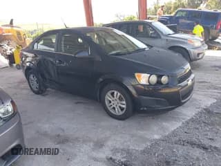 ✅ 2014 Chevrolet Sonic LT • VIN: 1G1JC5SB3E4145128 • Lot: 43123359. Listed on IAAI with 118,823 mi. Free auction sales archive from the USA and detailed vehicle history report at DreamBid. Image 1.