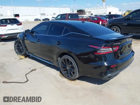 ✅ 2021 Nissan Maxima SR • VIN: 1N4AA6EV0MC512571 • Lot: 43441315. Wystawiony na IAAI z przebiegiem 65 079 mil. Bezpłatny archiwum sprzedaży aukcyjnych z USA i szczegółowy raport historii pojazdu na DreamBid. Zdjęcie 3.