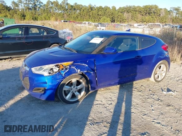 ✅ 2014 Hyundai Veloster • VIN: KMHTC6AD7EU199939 • Lot: 41289277. Wystawiony na IAAI z przebiegiem 192 798 mil. Bezpłatny archiwum sprzedaży aukcyjnych z USA i szczegółowy raport historii pojazdu na DreamBid. Zdjęcie 2.