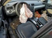 ✅ 2012 Volkswagen Passat SE • VIN: 1VWBP7A35CC059776 • Lot: 93387235. Listed on Copart with 252,488 mi. Free auction sales archive from the USA and detailed vehicle history report at DreamBid. Image 8.