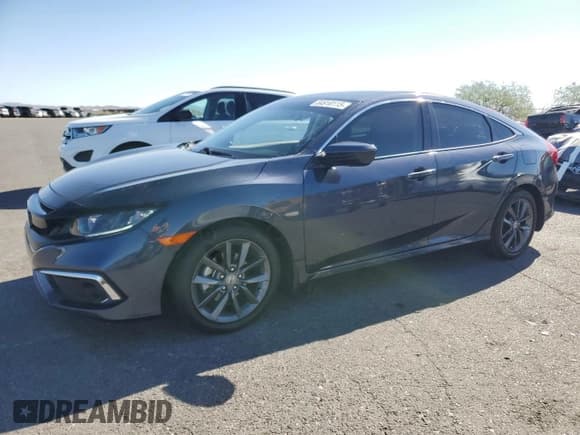 ✅ 2021 Honda Civic EX-L • VIN: 2HGFC1F71MH703203 • Лот: 84910115. Опубликован ранее на Copart с пробегом 20 975 миль. Бесплатный доступ к архиву аукционных продаж из США и подробный отчёт об истории автомобиля на DreamBid. Изображение 1.