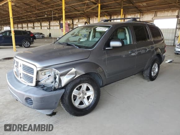 ✅ 2006 Dodge Durango SXT • VIN: 1D4HB38N56F131206 • Лот: 63161375. Опубликован ранее на Copart с пробегом 127 554 миль. Бесплатный доступ к архиву аукционных продаж из США и подробный отчёт об истории автомобиля на DreamBid. Изображение 1.