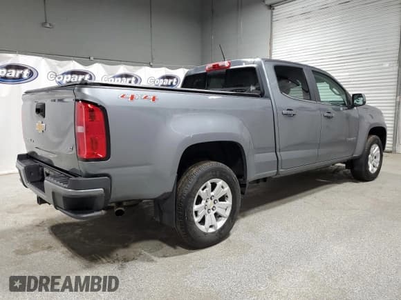 ✅ 2020 Chevrolet Colorado 4WD LT • VIN: 1GCGTCEN5L1151555 • Лот: 51833345. Опубликован ранее на Copart с пробегом 102 959 миль. Бесплатный доступ к архиву аукционных продаж из США и подробный отчёт об истории автомобиля на DreamBid. Изображение 3.