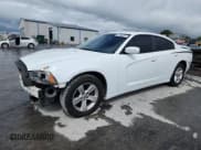 ✅ 2011 Dodge Charger Rallye • VIN: 2B3CL3CGXBH502738 • Lot: 81586825. Listed on Copart with 148,100 mi. Free auction sales archive from the USA and detailed vehicle history report at DreamBid. Image 1.