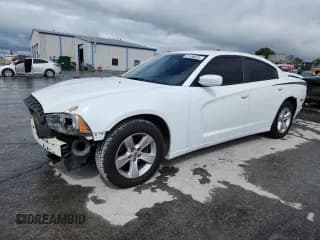 ✅ 2011 Dodge Charger Rallye • VIN: 2B3CL3CGXBH502738 • Lot: 81586825. Listed on Copart with 148,100 mi. Free auction sales archive from the USA and detailed vehicle history report at DreamBid. Image 1.