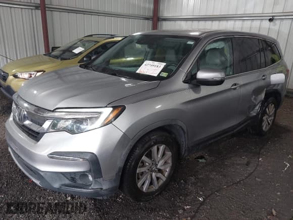 ✅ 2019 Honda Pilot EX-L • VIN: 5FNYF5H52KB034928 • Lot: 42749183. Listed on IAAI with 82,661 mi. Free auction sales archive from the USA and detailed vehicle history report at DreamBid. Image 17.